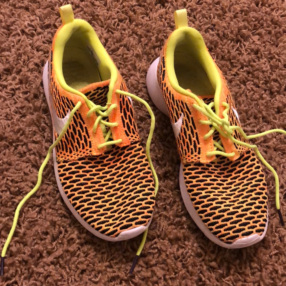 Lightly worn woman Nike tennis shoes